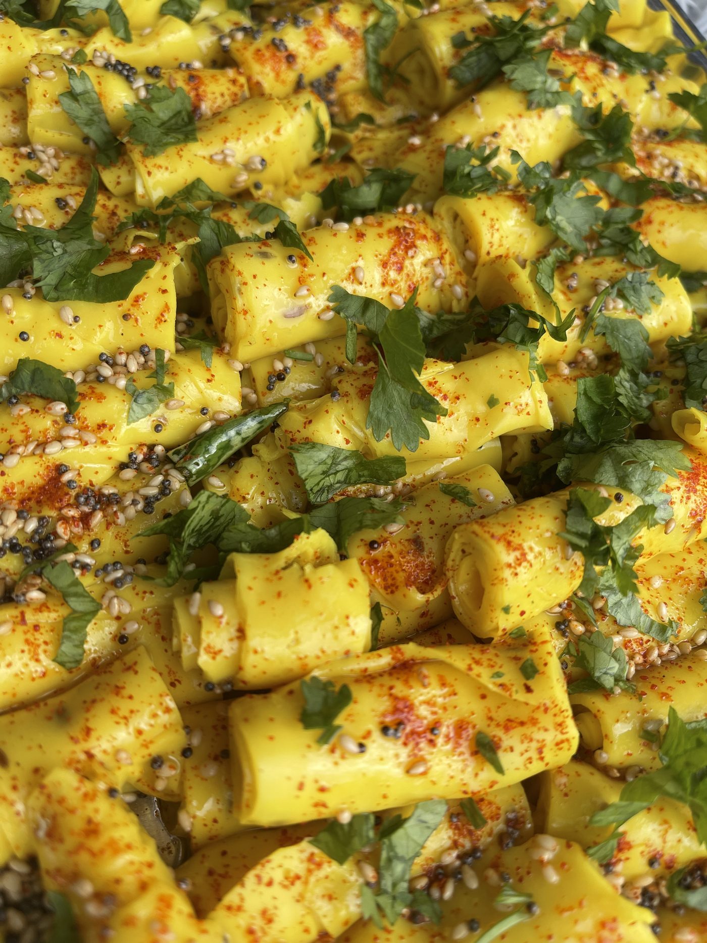 Fresh dhokla, cut and garnished